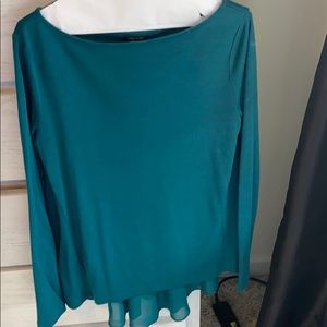 Long sleeve tee. See through mesh in back